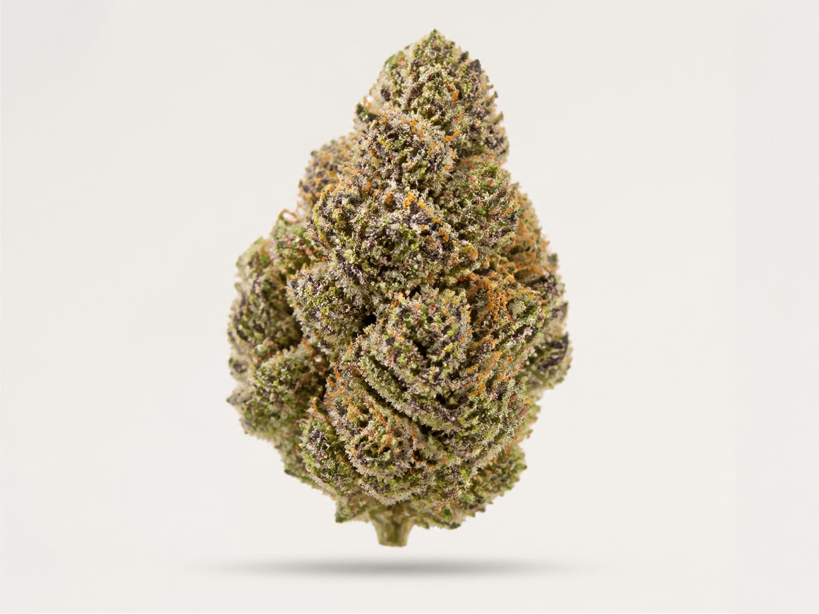 A premium cannabis flower on an off-white background
